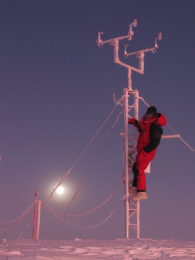 [20050723_002_WeatherStationClean.jpg]
That's me cleaning up the ice deposited on the anemometer of the weather station, moon in the background.