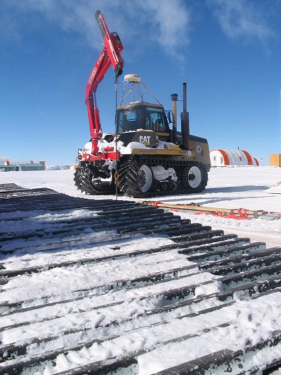 [ChallengerChain.jpg]
A challenger tractor and the chain of the crane.