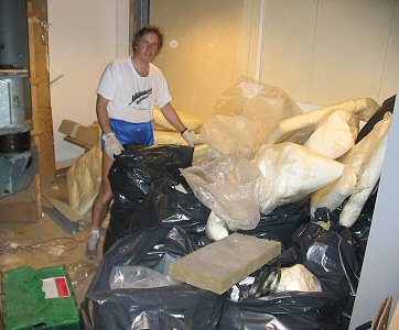 [GarbageMessRoberto.jpg]
Roberto sorting out the garbage left from unpacking the hospital equipment.