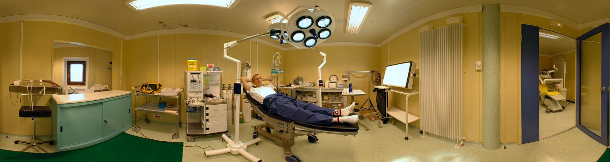 [PanoHospital.jpg]
Roberto on the cutting board of the surgery room. The dentist chair is visible through the door on the right.