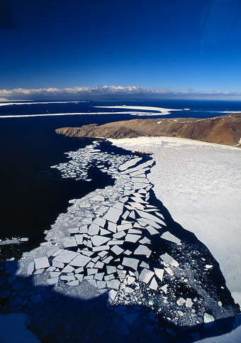 [ItalicaTNB.jpg]
The MS Italica, the italian Antarctic ship, at rest in the bay of Terra Nova seen from a helicopter. Mario Zuchelli Station (MZS) can be guessed in the background on the rock peninsula. The sea ice is breaking away from the bay. The chopper is flying from the late season landing field on the glacier behind to the MZS station.