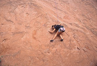 [GotGFace.jpg]
Jenny face climbing a sandy 5.10.