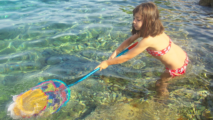 [20210727_075911_Croatia.jpg]
Here our little fisher girl trying to catch enough shrimps for appetizers.