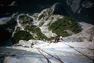 [HalfDomeHighUp.jpg]
Jenny, Vincent & Co baking in the sun on the upper part of the route.