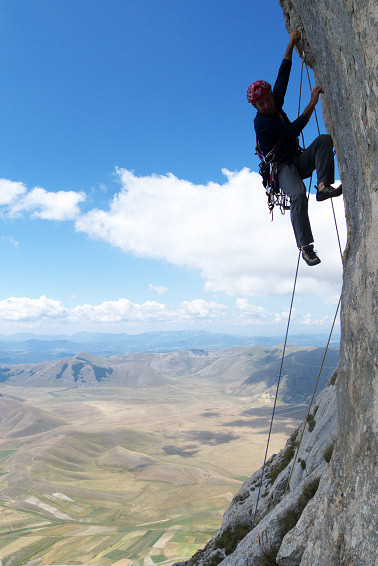 [20090812_114520_Vettore.jpg]
Tonino on an overhanging slab, seconds before breaking the glued-on hold. He's a purist but didn't do it on purpose.