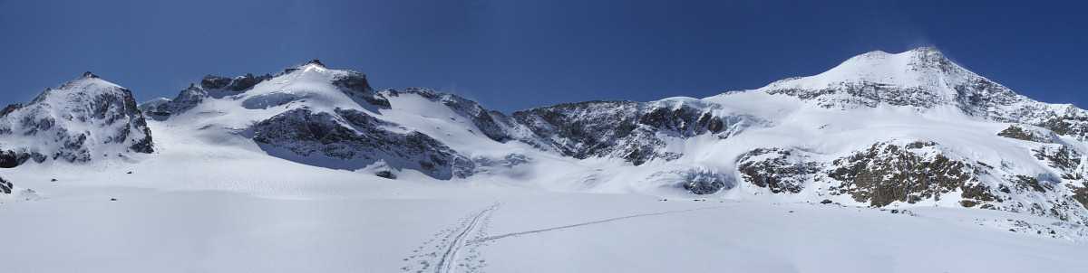 [20080501_102836_AlbaronFromCiamarellaPano_.jpg]
Panorama taken from the Evettes field, with the ice near the summit of the small Ciamarella reflecting the sunlight on the left and the long ridge of the Albaron quite visible on the right. We plan on doing both. A few seracs are visible on the lower part of the Ciamarella glacier.