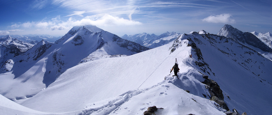 [20080502_075639_AlbaronCrestPano_.jpg]
Upon reaching the shoulder of the Albaron, there's still a long way to go on a ridge traverse. It's not too exposed but the presence of some mixed climbing makes it safer to rope up. The Ciamarella of the previous day dominates the background (with a cloud on top). The Bessanese follows the natural ridge.