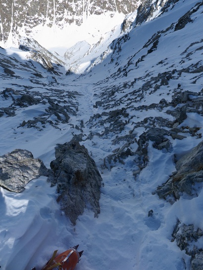 [20110323_123325_Burlan.jpg]
The start of the descent of the Burlan: 50m of rock with a sprinkle of snow on top, then I put the skis on and almost fall immediately after hitting a hidden rock. 50 degrees at the start, so not something that you want to come down head first.