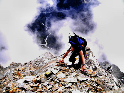 [171-TheLastStepBeforeGlacier.jpg]
Jens reaching the flat ground at the very top of the 3rd buttress. The snow starts here. (Photo Jens Pohl)