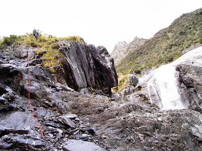 [187-TheGreatMoment.jpg]
Rappelling down the river, finally: 12 hours to find the proper place. (Photo Jens Pohl)