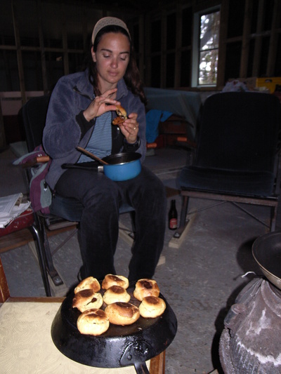 [20051221_0207_Choux.jpg]
Jenny enjoying some chocolate choux freshly baked on the stove of Homer Hut...