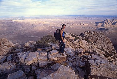 [WhiskeyPeak.jpg]
A tired Jennifer on the summit of Whiskey Peak after climbing Epinephrine in 8 hours