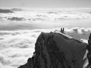 Skiers a short way below the summit of Chamechaude