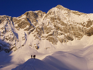 Sunrise on the Peak Neige Cordier (3614m), the way up is farther to the right but it's possible to ski down the steep gash in the middle