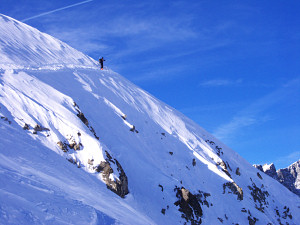 Exposed traverse up the Peak Neige Cordier