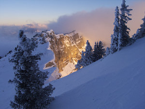 Sunrise between the clouds on the St Michel Peak