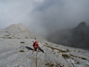 Climbing the slabs of the Clessidre route, Prima Spalla