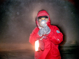 Emanuele in sampling garb, with the flash throwing a shadow on his frozen breath