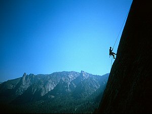 Vincent rappelling off the Central Pillar of Frenzy. Middle Cathedral